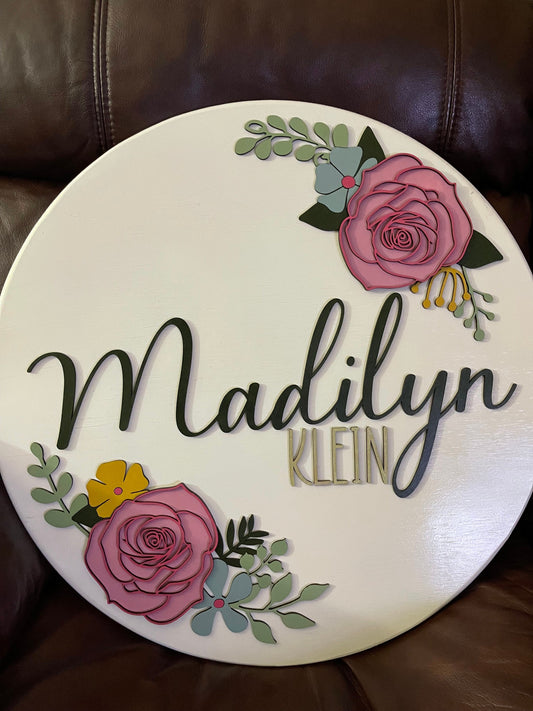 Round floral name sign